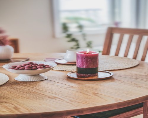 Water and simple food on a table with warm light